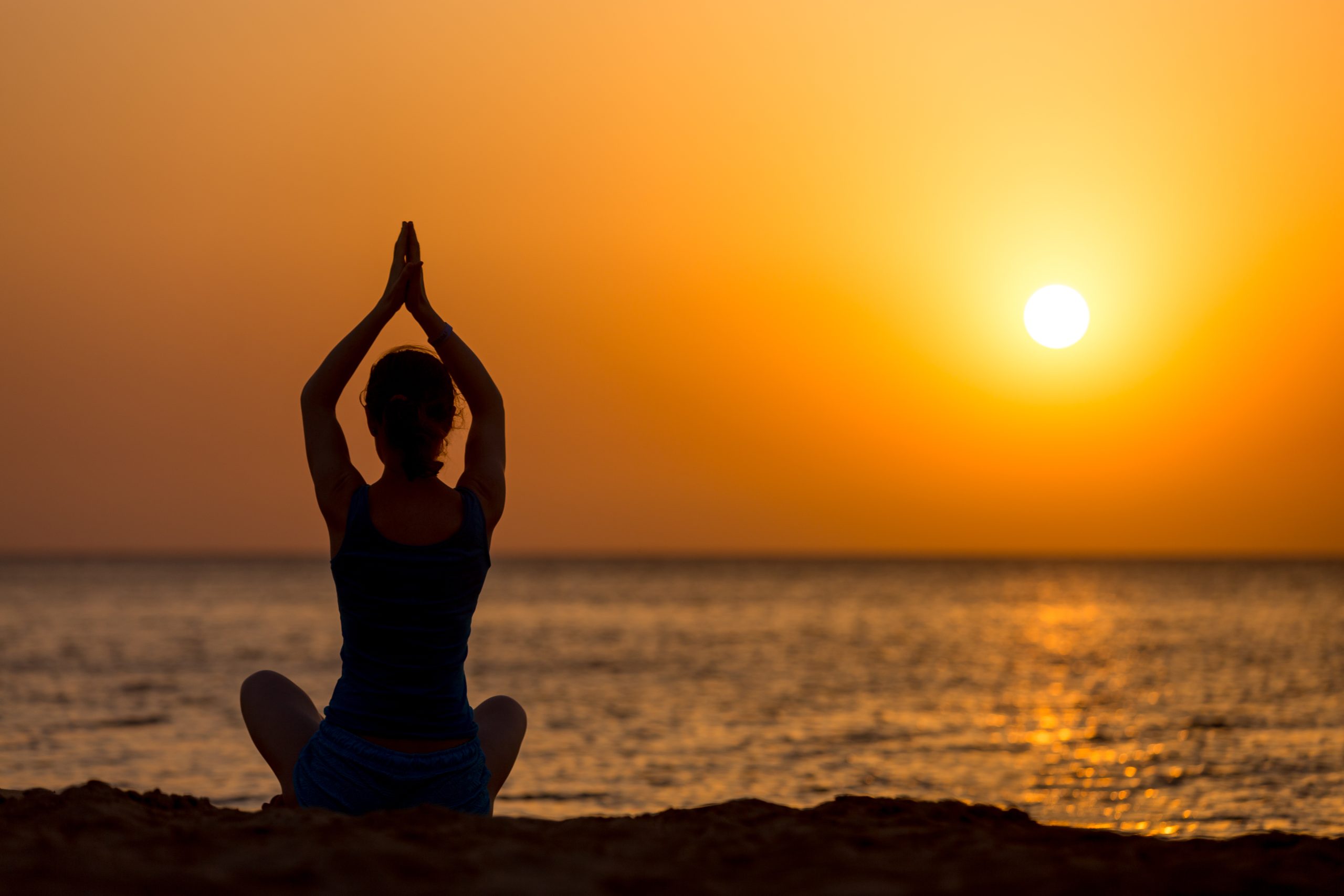 Yoga practice on the beach